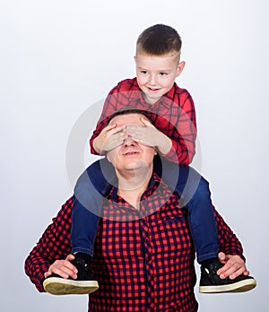 Best friends forever. Father little son red shirts family look outfit. Dad piggybacking adorable child. Happiness being