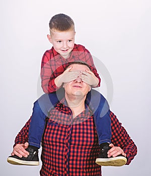 Best friends forever. Father little son red shirts family look outfit. Dad piggybacking adorable child. Happiness being