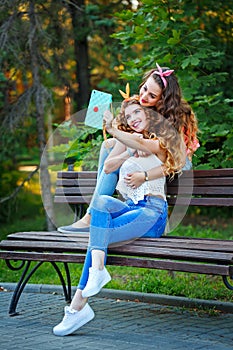 Best friends hug. Photos in park. Group selfies.