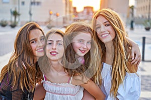 Best friends teen girls at sunset in the city