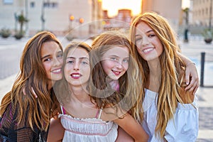 Best friends teen girls at sunset in the city photo
