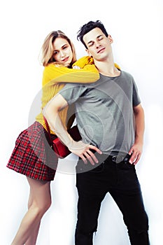 Best friends teenage couple girl and boy together having fun, posing emotional on white background, couple happy smiling