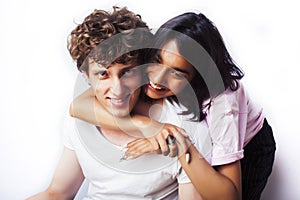 Best friends teenage girl and boy together having fun, posing emotional on white background, couple happy smiling