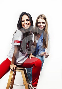 Best friends teenage girls together having fun, posing emotional on white background, besties happy smiling, lifestyle