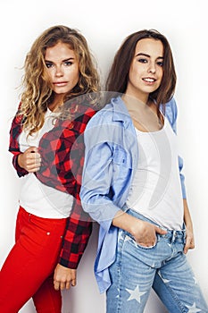 Best friends teenage girls together having fun, posing emotional on white background, besties happy smiling, lifestyle