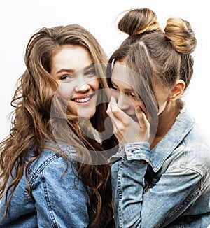 Best friends teenage girls together having fun, posing emotional on white background, besties happy smiling, lifestyle