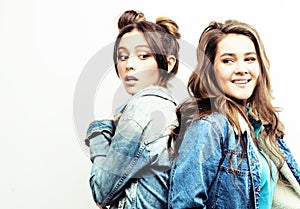 Best friends teenage girls together having fun, posing emotional on white background, besties happy smiling, lifestyle