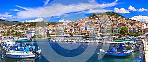 Best of Greece - travel in Lesvos Island, scenic  Plomarion town with traditional fishing boats
