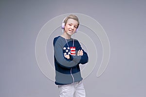 Best music. Happy guy in headphones enjoying his favorite songs and smiling