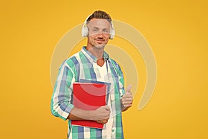 Best online learning platforms to explore. Man listening online lecture. Adult student listen music. Guy wear headphones