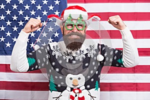Best party ever. Christmas in usa. Santa on american flag background. Bearded american man celebrate new year. National