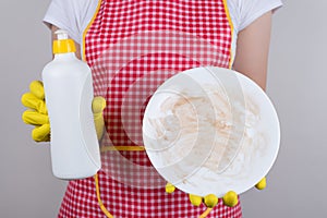 Best product for removing grease from crockery is using good detergent concept. Cropped close up photo of upset restaurant worker