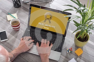 Best quality concept on a laptop