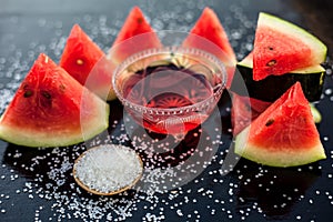 Best recipe ingredient to make homemade sugar scrub on wooden surface consisting of watermelon pulp well mixed with sugar in a