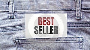 BEST SELLER words on a white paper stuck out from jeans pocket. Business concept