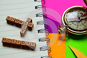 Best summer holiday message written on wooden blocks. Vacation and travel concepts. Cross processed image