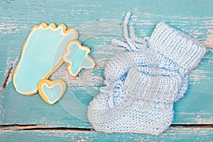 Best whishes for the newborn baby boy, blue cookies and shoes on