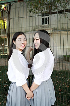 Bestie Lovely beauty Asia Chinese high school girl student smile enjoy free time on playground best friend