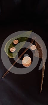 Betel leaf ,betel nut and wet limestone in a box. Assamese people are welcomed with such betel leaf in India.