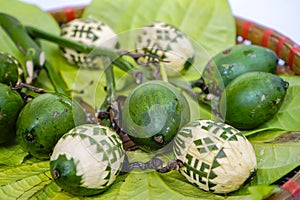 Betel leaf and the nuts or Areca Catechu (Trau Cau) necessary to make paan, a necessary and traditional intake at Tet holiday