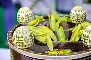 Betel leaf and the nuts or Areca Catechu (Trau Cau) necessary to make paan, a necessary and traditional intake at Tet holiday