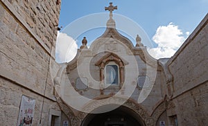 Bethlehem, Israel - September 12, 2018: The main entrance to The Chapel of the Milk Grotto of Our Lady in Bethlehem.