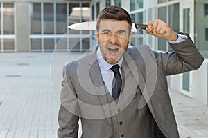 Betrayed businessman looking shocked in the office