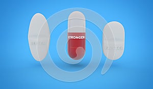 Better, stronger, faster text impressed on three pills isolated on blue background