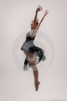 Beuatiful female dancer. White background