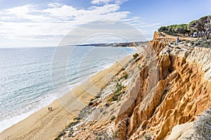 Beutiful cliffs along Falesia Beach in Albufeira, Algarve, Portugal photo