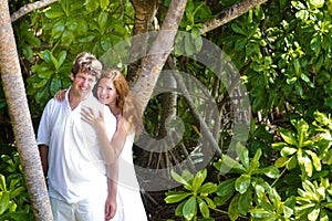 Beutiful couple in a tropical jungle