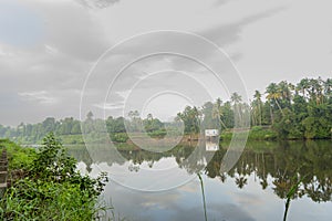 A beutiful scenery of landscape with river, sky in village in kerala, india