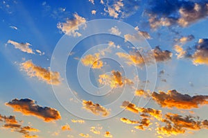 Beutifull sunset cloudy sky with yellow clouds photo