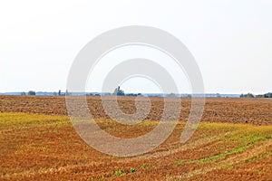 Beveled haystack, summer, straw wrapped on the field