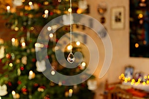 Christmassy Illuminated Interior with Christmas Tree - Bokeh Closeup photo
