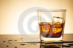 Beverage from cola in glass with ice in studio lighting,beverage in summer is sparkling water