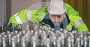 Beverage factory production line engineer checking production line