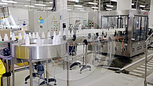 Beverage industry manufacturing line. Milk bottles on conveyor belt