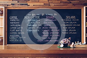 Beverage menu on blackboard at cafe coffee shop