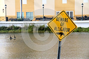 Beware of alligator warning caution sign