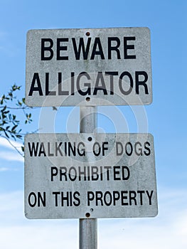 Beware alligator warning sign, walking of dogs prohibited - Davie, Florida, USA