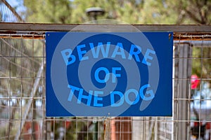 Beware of the dog, message on blue sign background