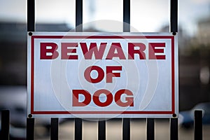 Beware of Dog Sign on Fence.