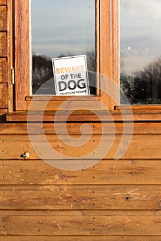 Beware Of Dog Sign in Window