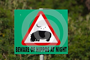 Beware of Hippos at night sign