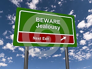 beware jealousy next exit traffic sign on blue sky