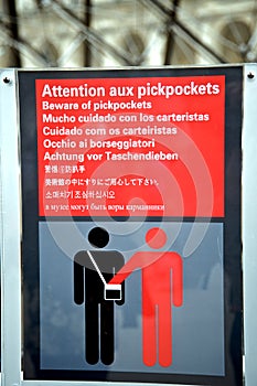 Beware of pickpockets sign