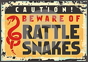 Beware of rattlesnakes caution sign