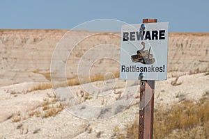 Beware of Rattlesnakes signpost in the Badlands South, Dakota