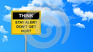 Think stay alert don`t get hurt traffic sign